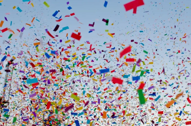 Multi Color Papers Flying in the Air Image