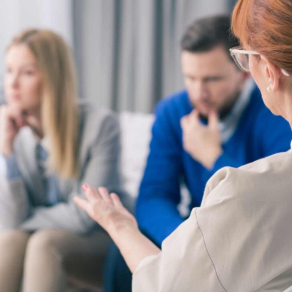 People having a discussion with a mediator